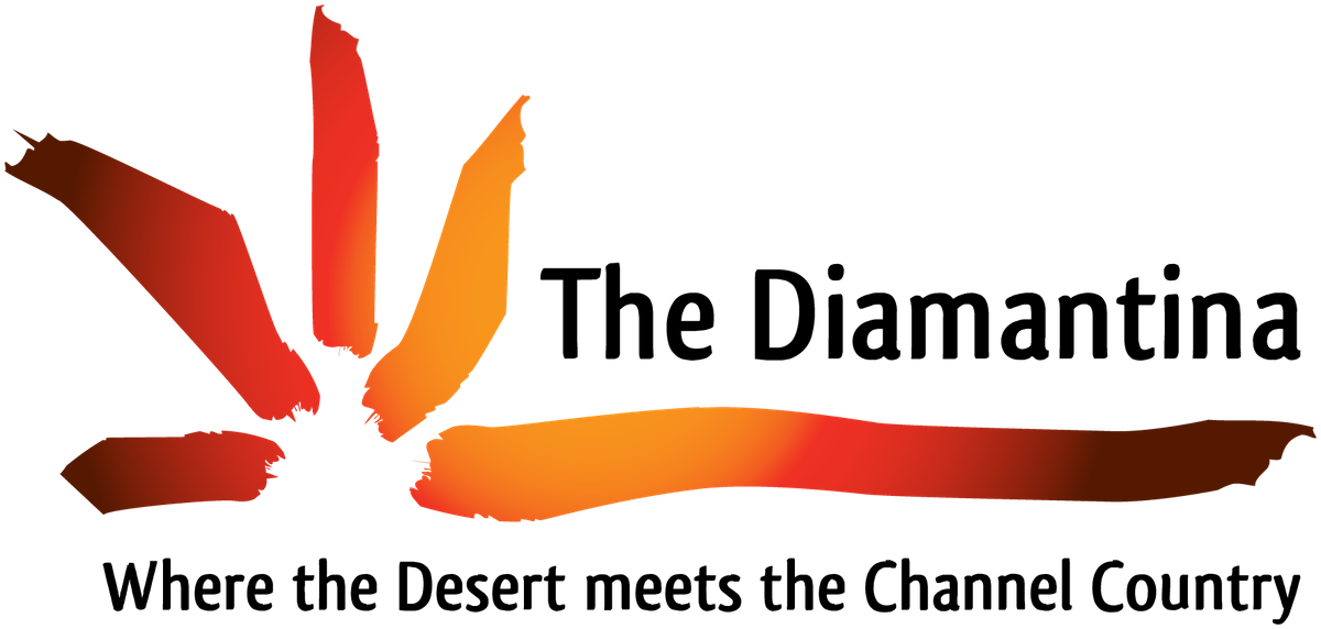 Emblem of Diamantina Shire Council featuring a buffalo, flowers, and a shield with a tower and eagle.