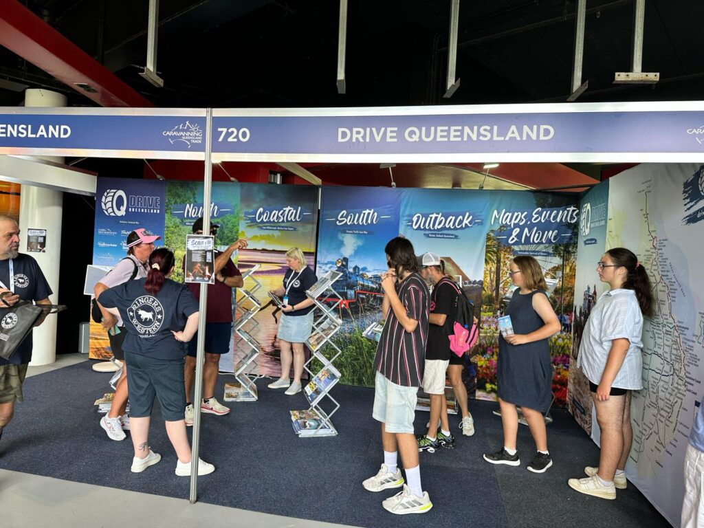 A group of people stands at the 