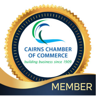 Gold badge with "Cairns Chamber of Commerce, building business since 1909" logo in the center and "MEMBER" written at the bottom.