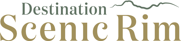 Destination Scenic Rim logo with stylized mountain outline above the text.